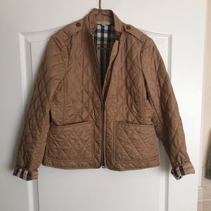 Woman’s Burberry jacket
